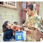 a lady health worker administers polio vaccine to a child in a karachi neighbourhood on monday photo jalal qureshi express